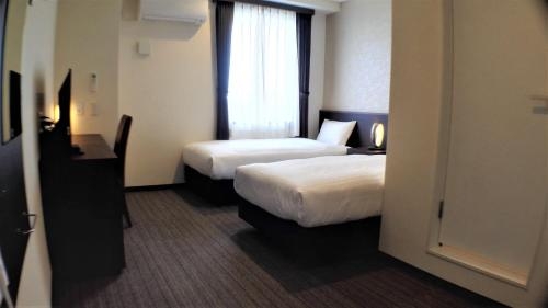 Imagen de la habitación del Hotel Bande Osaka. Foto 6