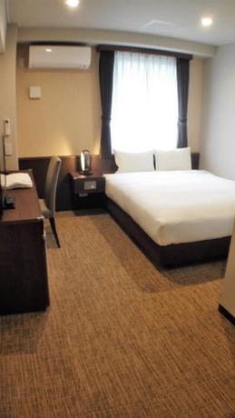 Imagen de la habitación del Hotel Bande Osaka. Foto 7
