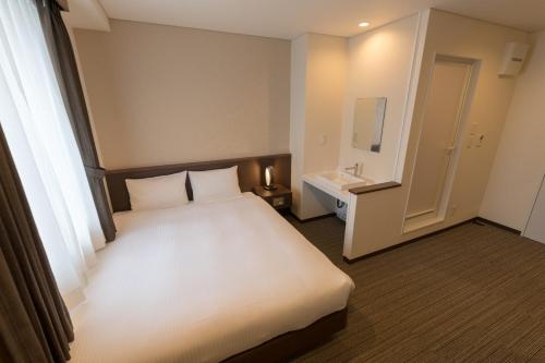Imagen de la habitación del Hotel Bande Osaka. Foto 8