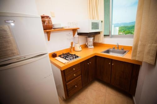 Imagen de la habitación del Hotel Banderas Suites. Foto 8