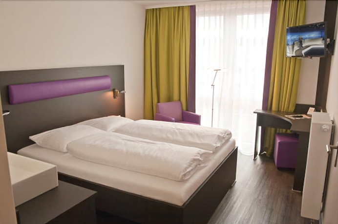 Imagen de la habitación del Hotel Bandf Am Neumarkt. Foto 6