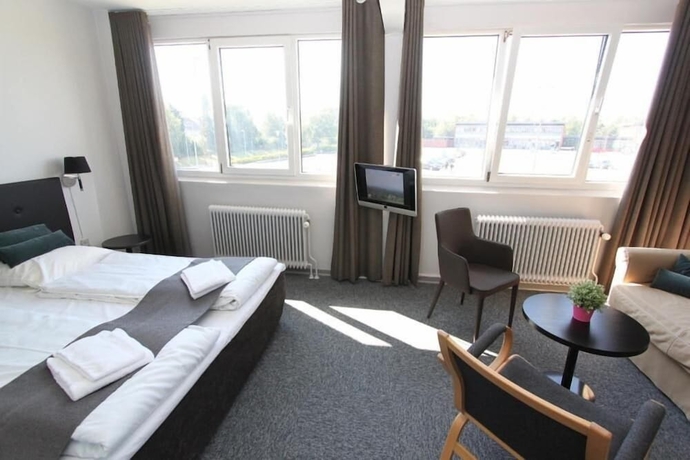 Imagen de la habitación del Hotel Banegaardshotellet. Foto 5
