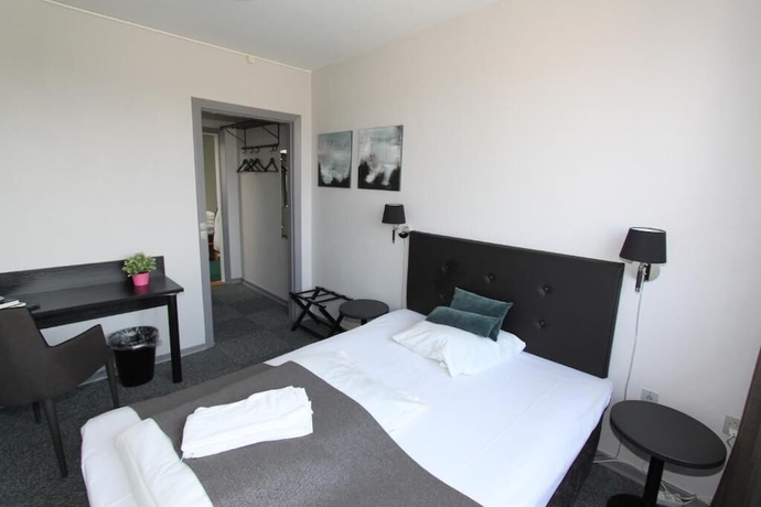 Imagen de la habitación del Hotel Banegaardshotellet. Foto 7