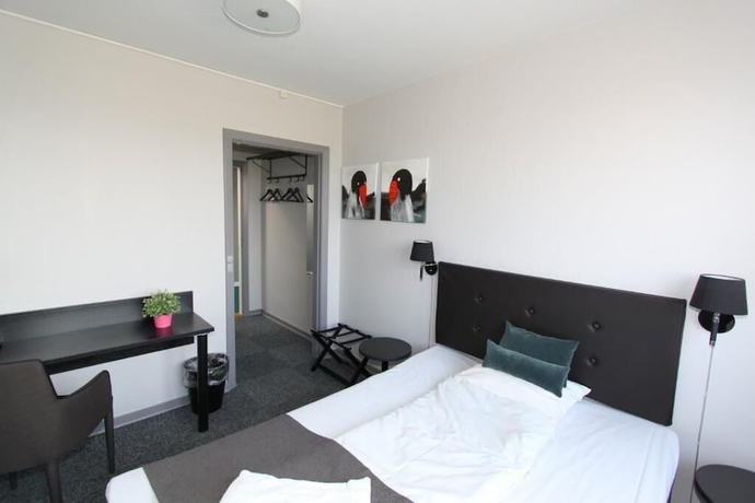 Imagen de la habitación del Hotel Banegaardshotellet. Foto 9