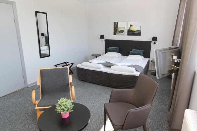 Imagen de la habitación del Hotel Banegaardshotellet. Foto 10