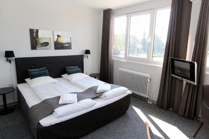 Imagen de la habitación del Hotel Banegaardshotellet. Foto 11