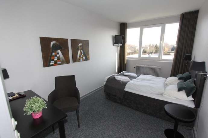 Imagen de la habitación del Hotel Banegaardshotellet. Foto 12