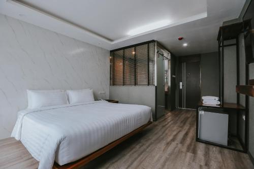 Imagen de la habitación del Hotel Bangkok City Link Hotel. Foto 6