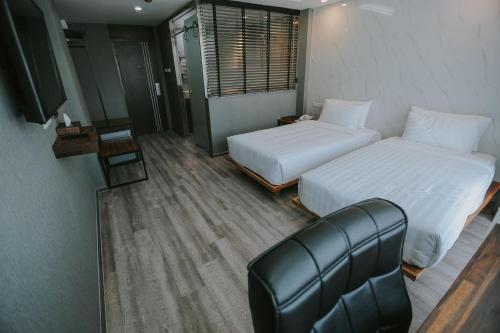 Imagen de la habitación del Hotel Bangkok City Link Hotel. Foto 9