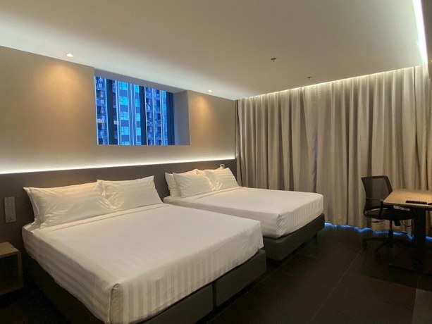 Imagen de la habitación del Hotel Bangkok City Rama 9 Hotel. Foto 2