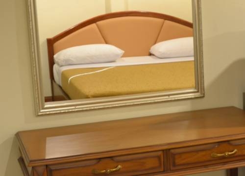 Imagen de la habitación del Hotel Bangkok Condotel. Foto 34