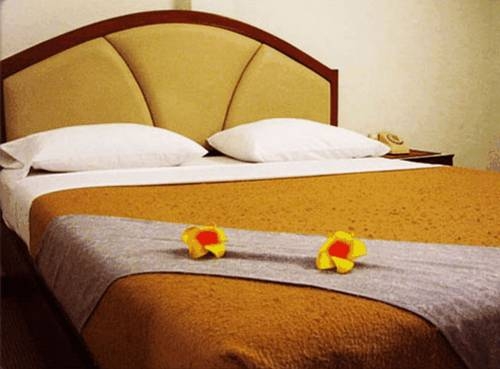 Imagen de la habitación del Hotel Bangkok Condotel. Foto 35