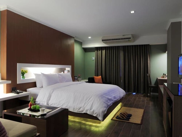 Imagen de la habitación del Hotel Bangkok Inter Place. Foto 16