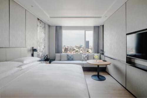 Imagen de la habitación del Hotel Bangkok Marriott The Surawongse. Foto 6