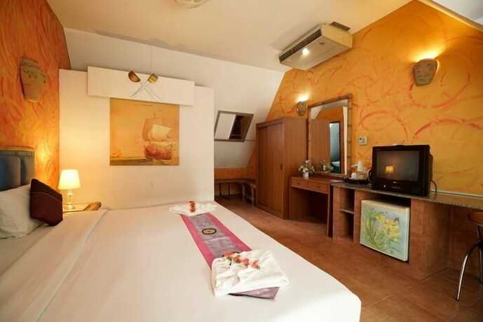 Imagen de la habitación del Hotel Bangrak Samui Beach Resort. Foto 14
