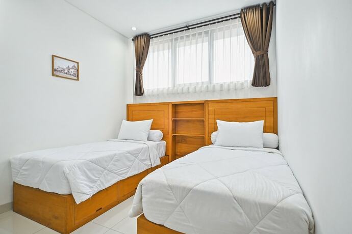 Imagen de la habitación del Hotel Bangreng Inn. Foto 16