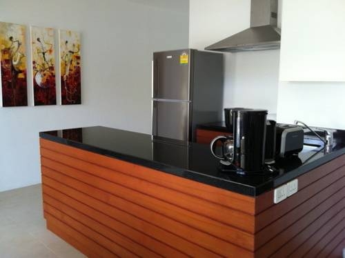 Imagen de la habitación del Hotel Bangtao Private Villas. Foto 16