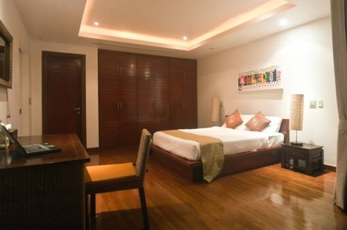 Imagen de la habitación del Hotel Bangtao Private Villas. Foto 19