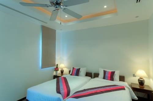 Imagen de la habitación del Hotel Bangtao Private Villas. Foto 21
