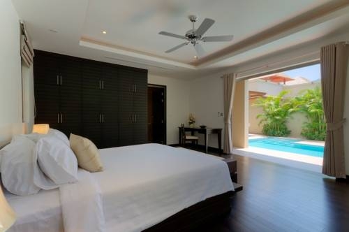Imagen de la habitación del Hotel Bangtao Private Villas. Foto 24
