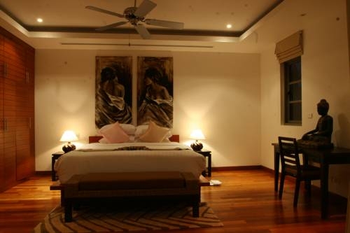 Imagen de la habitación del Hotel Bangtao Private Villas. Foto 34