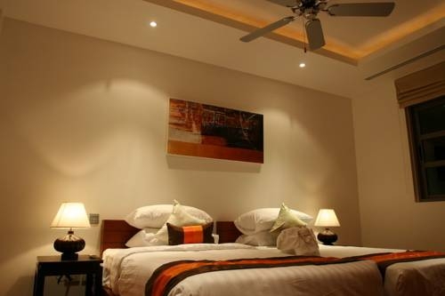 Imagen de la habitación del Hotel Bangtao Private Villas. Foto 35