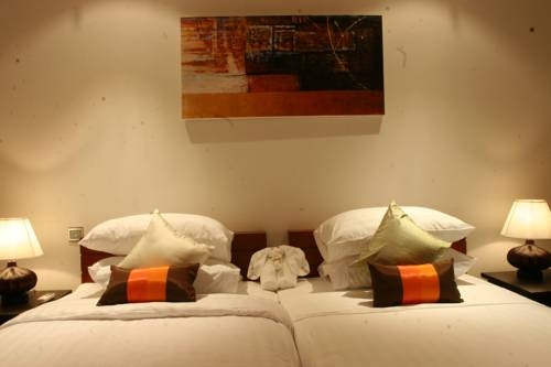Imagen de la habitación del Hotel Bangtao Private Villas. Foto 36
