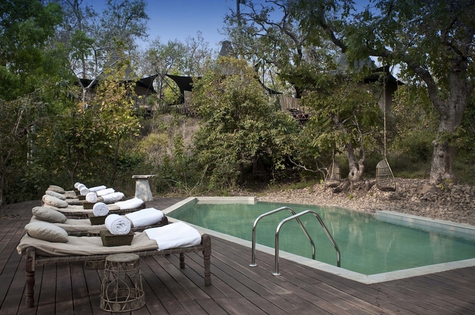 Imagen de la piscina del Hotel Banjaar Tola, Kanha National Park. Foto 18