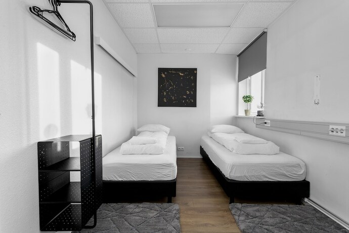 Imagen de la habitación del Hotel Bank Guesthouse. Foto 14