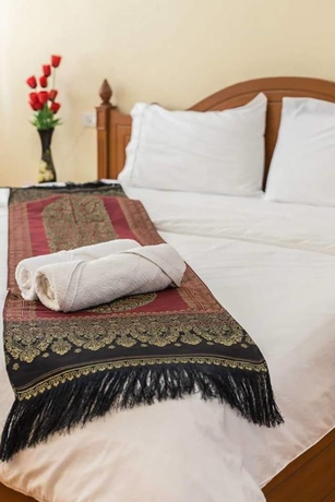 Imagen de la habitación del Hotel Bann Udomsap. Foto 18