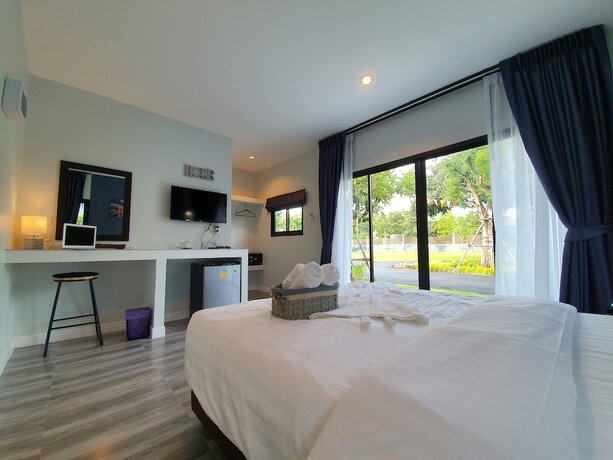 Imagen de la habitación del Hotel Bannjamjuree Resort Sattahip. Foto 17