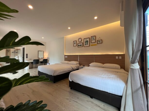 Imagen de la habitación del Hotel Bannjamjuree Resort Sattahip. Foto 19