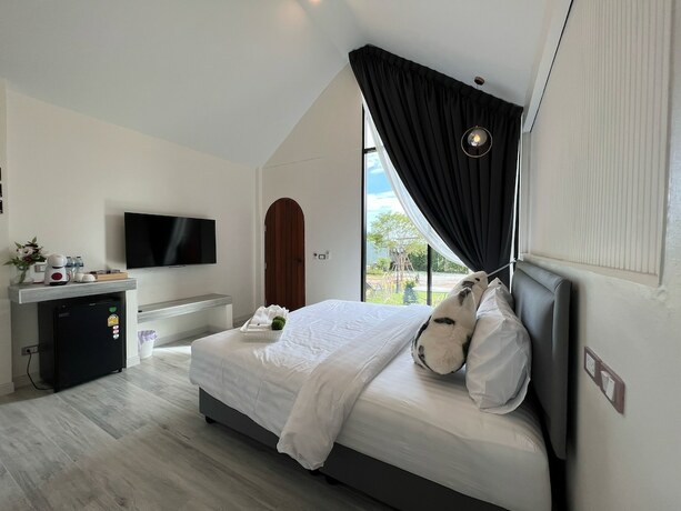 Imagen de la habitación del Hotel Bannjamjuree Resort Sattahip. Foto 20