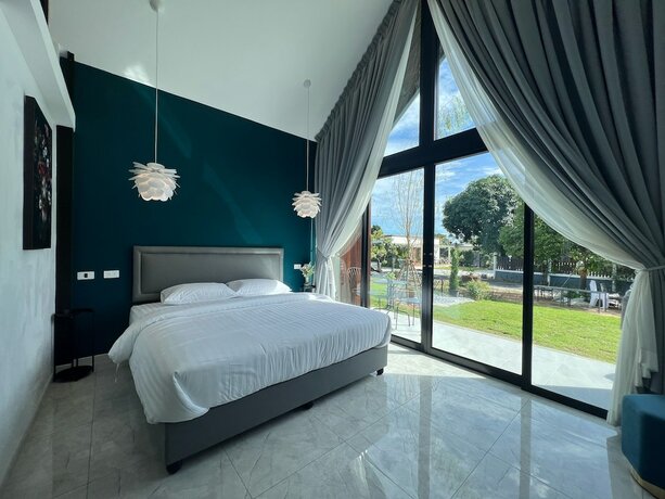 Imagen de la habitación del Hotel Bannjamjuree Resort Sattahip. Foto 21