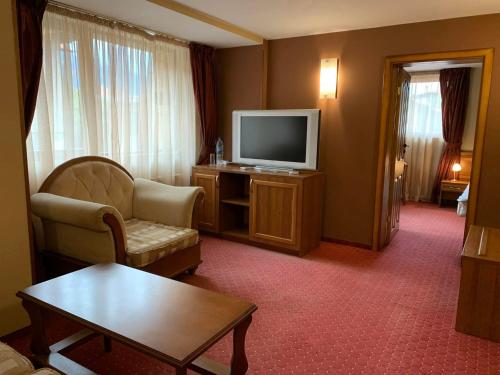 Imagen de la habitación del Hotel Bansko Boutique. Foto 19