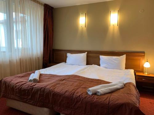Imagen de la habitación del Hotel Bansko Boutique. Foto 20