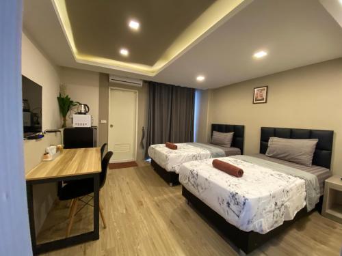 Imagen de la habitación del Hotel Bansuay Bangkadi. Foto 20