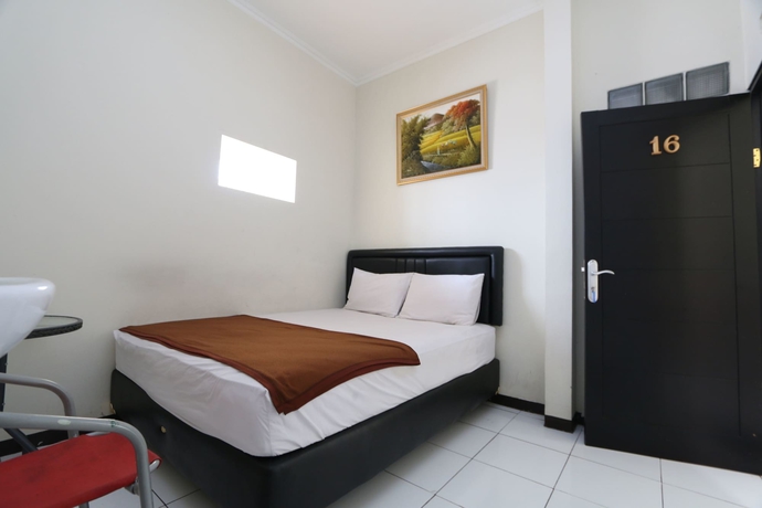 Imagen de la habitación del Hotel Bantal Guling Pasar Baru Bandung. Foto 4
