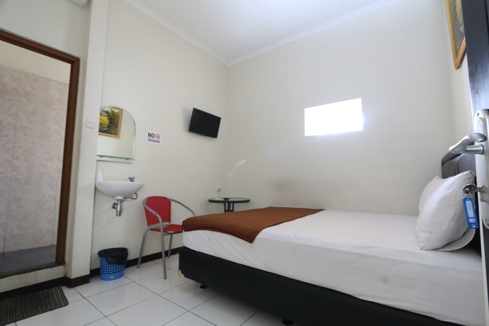 Imagen de la habitación del Hotel Bantal Guling Pasar Baru Bandung. Foto 8