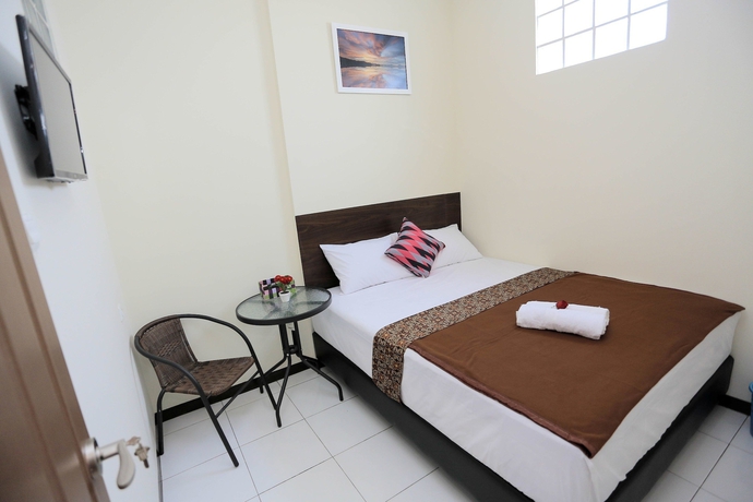 Imagen de la habitación del Hotel Bantal Guling Pasar Baru Bandung. Foto 10