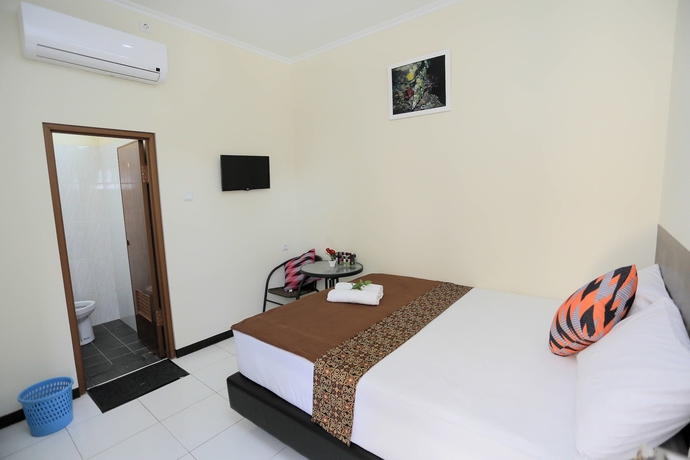 Imagen de la habitación del Hotel Bantal Guling Pasar Baru Bandung. Foto 11