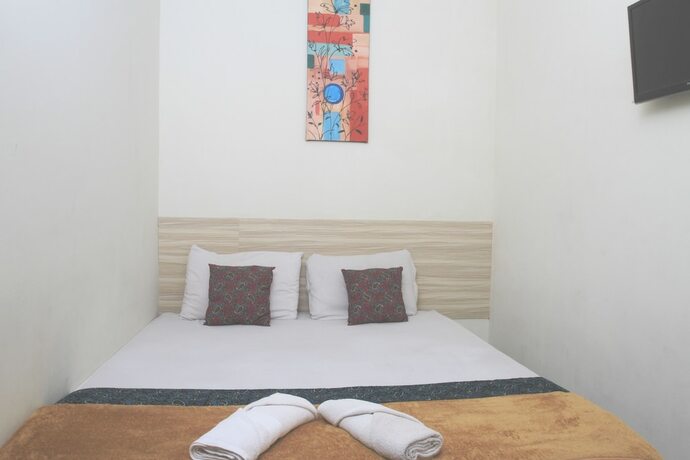 Imagen de la habitación del Hotel Bantal Guling Trans, Bandung. Foto 13