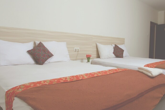 Imagen de la habitación del Hotel Bantal Guling Trans, Bandung. Foto 15