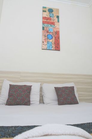 Imagen de la habitación del Hotel Bantal Guling Trans, Bandung. Foto 17