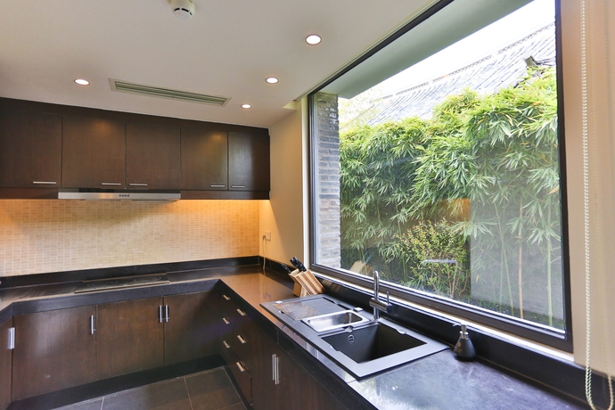 Imagen de la habitación del Hotel Banyan Tree Lijiang. Foto 3