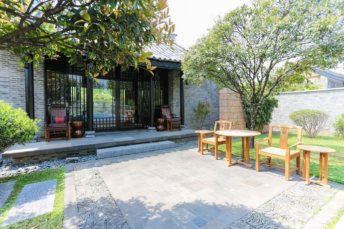 Imagen de la habitación del Hotel Banyan Tree Lijiang. Foto 4