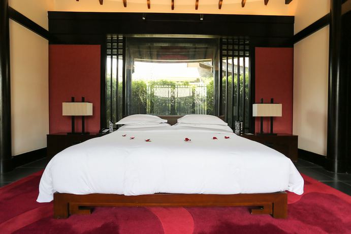 Imagen de la habitación del Hotel Banyan Tree Lijiang. Foto 7