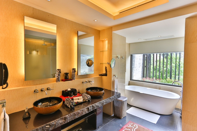 Imagen de la habitación del Hotel Banyan Tree Lijiang. Foto 10