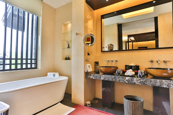 Imagen de la habitación del Hotel Banyan Tree Lijiang. Foto 11