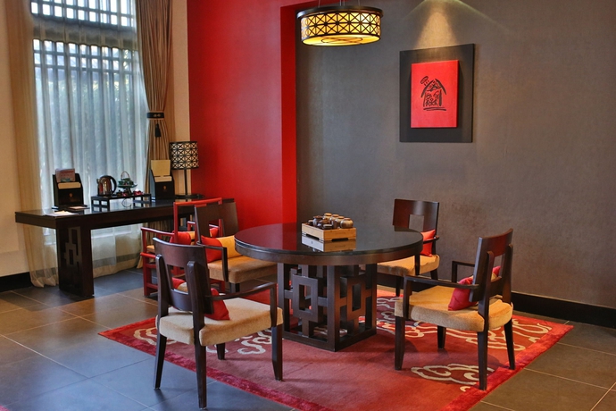 Imagen de la habitación del Hotel Banyan Tree Lijiang. Foto 13